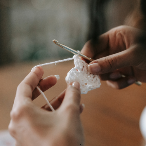 Person crocheting